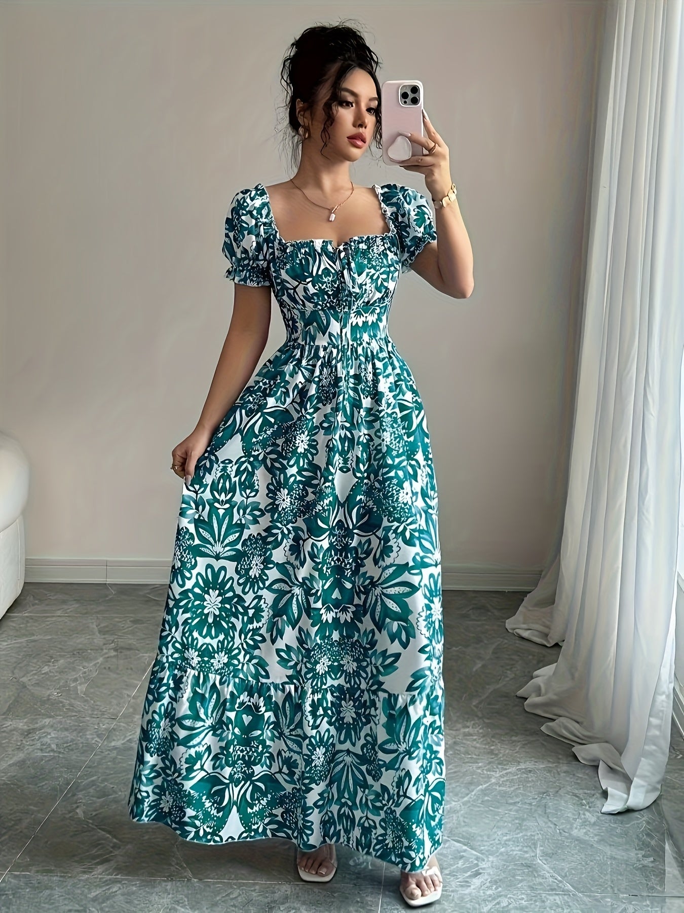 Elegant long dress with floral print.