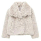 Elegant women's coat made of warm, fluffy faux fur