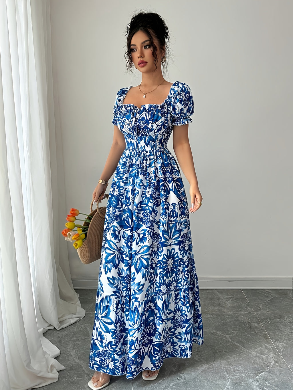 Elegant long dress with floral print.