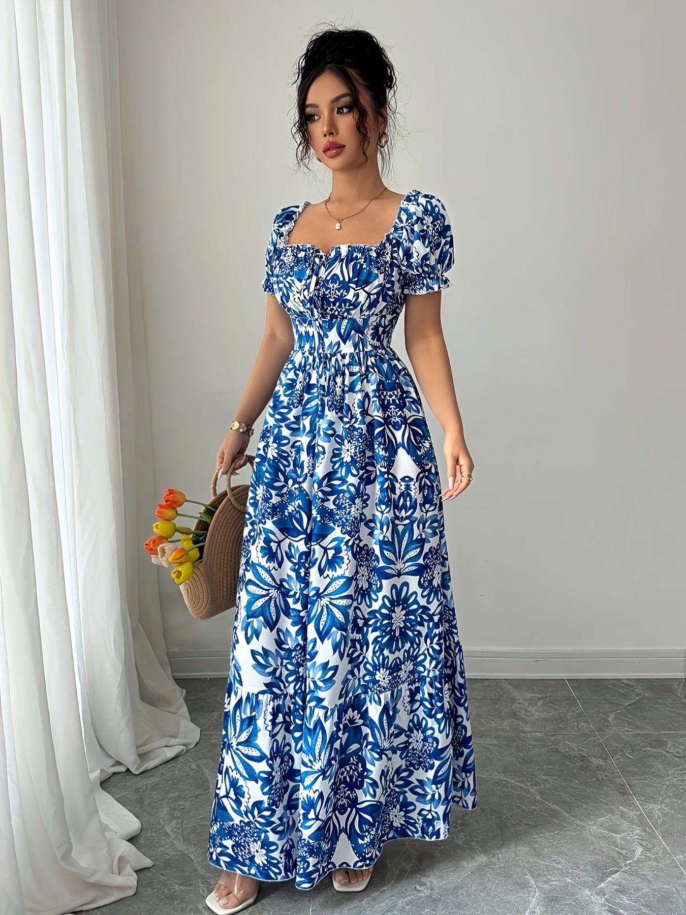 Elegant long dress with floral print.