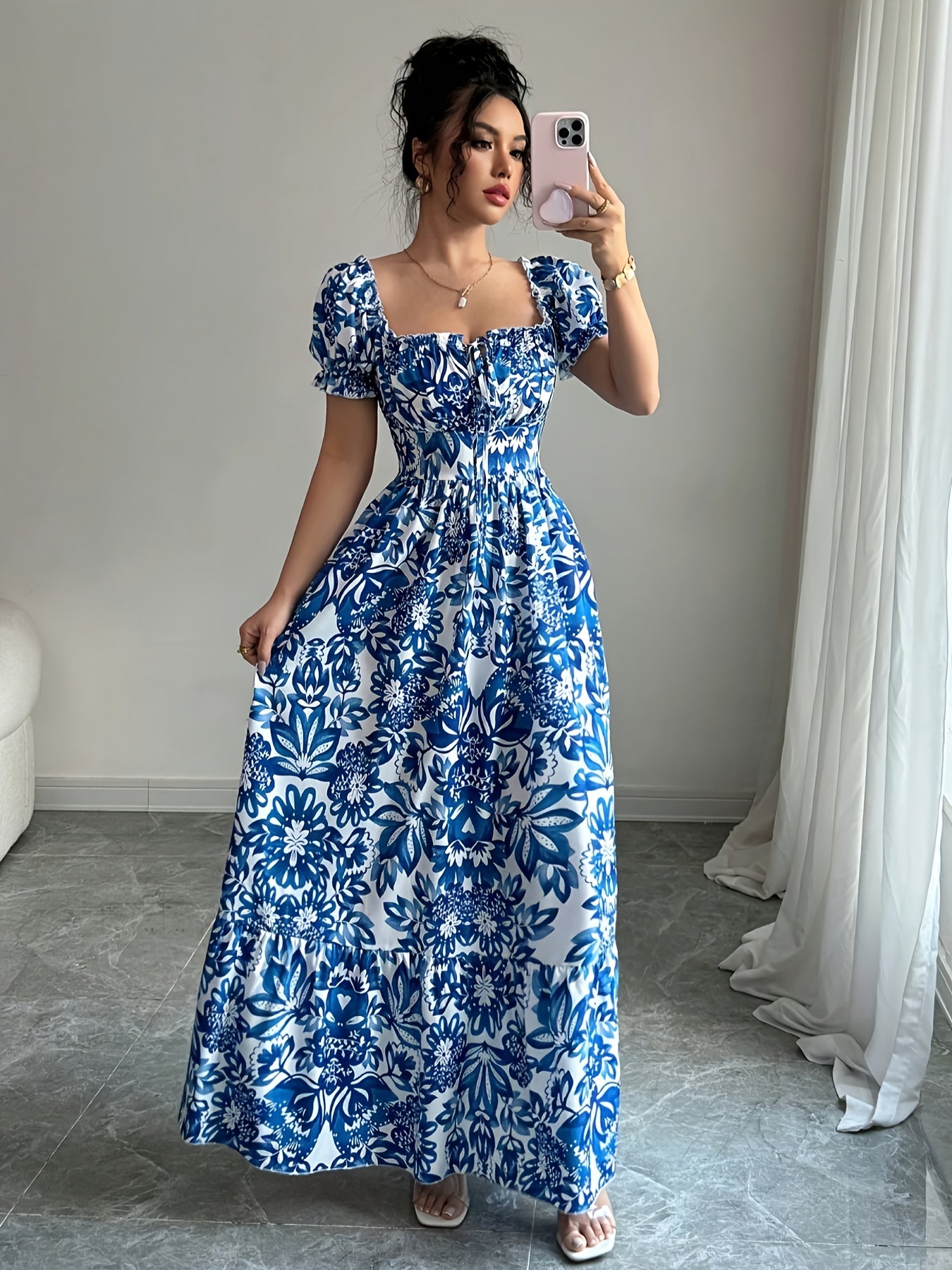 Elegant long dress with floral print.