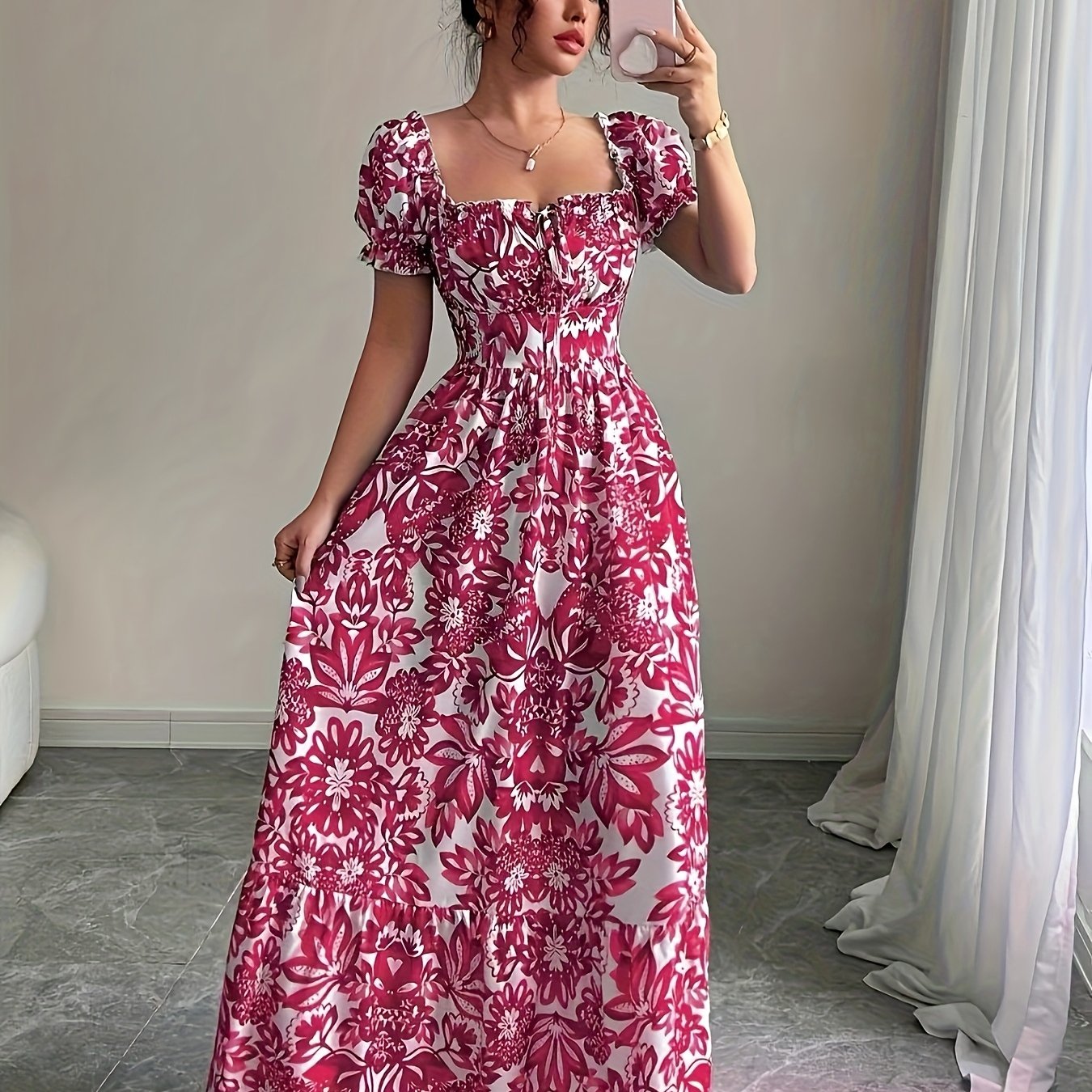 Elegant long dress with floral print.