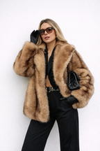 Women's short coat made of faux fur, warm and comfortabl
