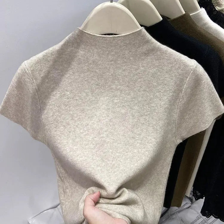 Elegant women's turtleneck sweater, fitted style