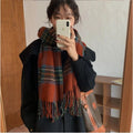 Women's winter scarf with a classic British plaid pattern