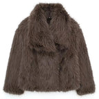 Elegant women's coat made of warm, fluffy faux fur