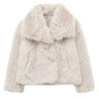 Elegant women's coat made of warm, fluffy faux fur